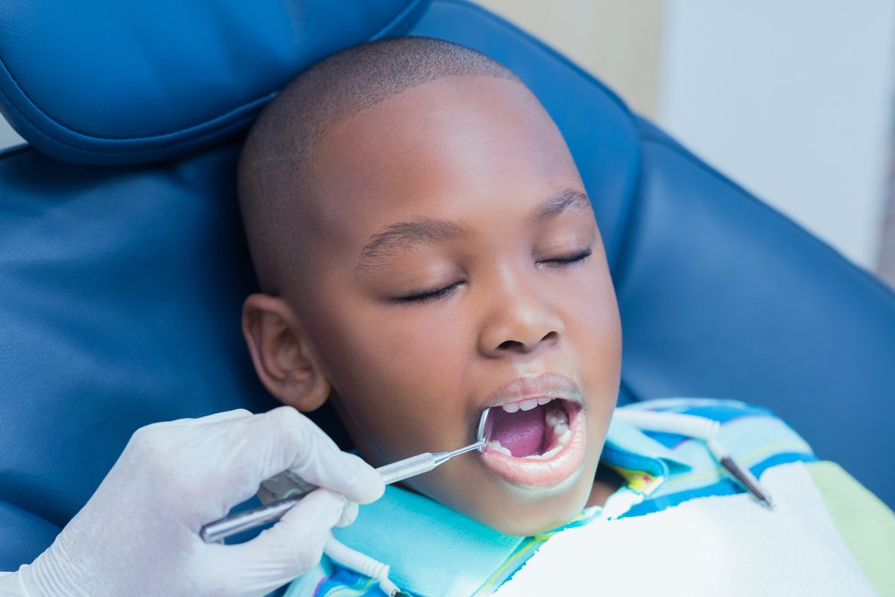 Close Up Of Boy Having His Teeth Examined
